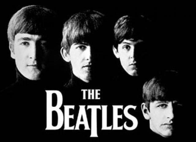 Saint Pierre Performing Tribute To The Beatles